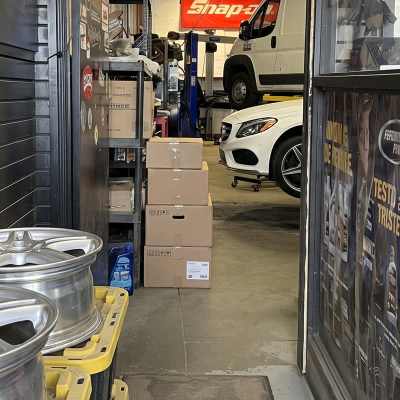 Alloy wheels and parts stock by the bay door
